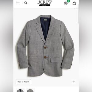 Boys size 14 charcoal suit. Work only once. In perfect condition.